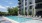 Community pool with ample lounge seating at Aventon Annapolis