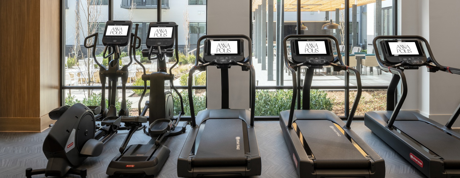 Large windows with ample natural lighting in Aventon Annapolis' community fitness center