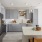 Dog-Friendly luxury apartments in Annapolis, MD - Aventon Annapolis - Kitchen with Stainless-Steel Appliances, Light Gray Shaker Cabinets, and Quartz Countertops.